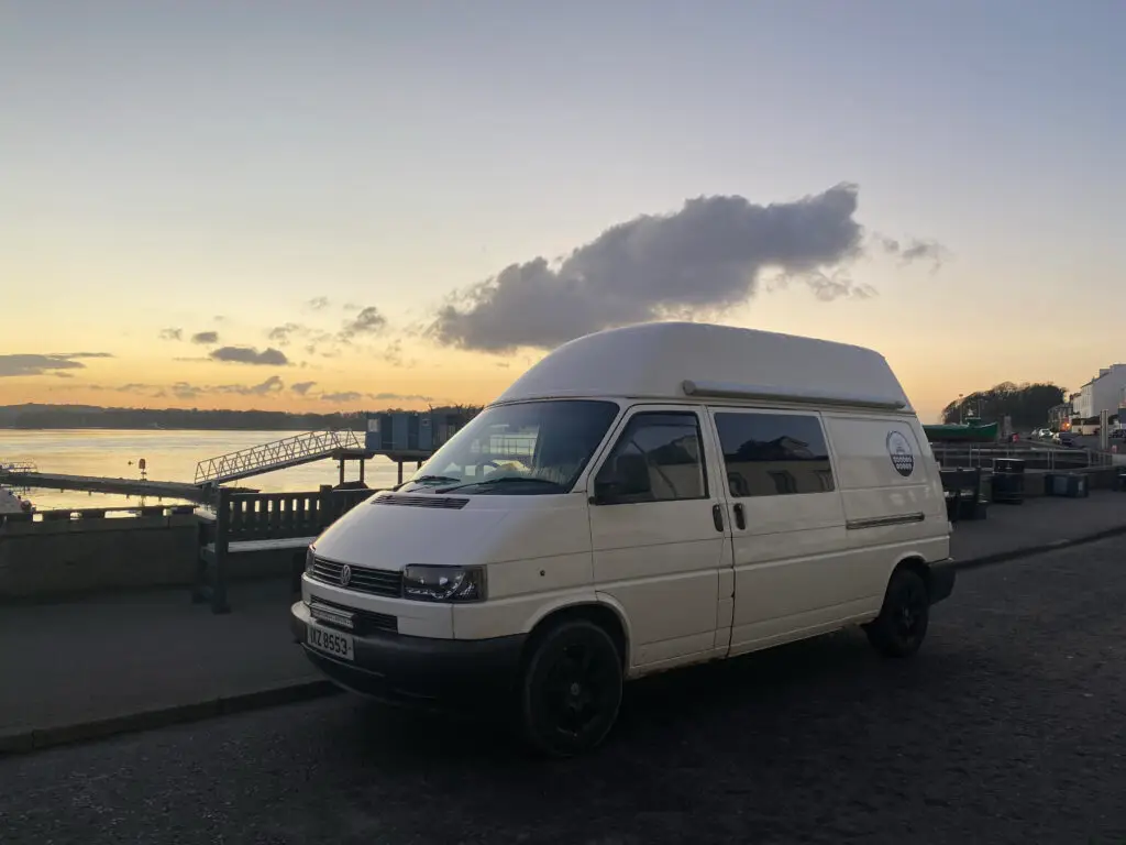 A white VW T4 high top parked in Portaferry, County Antrim, Northern Ireland. - DigitalNomadNI