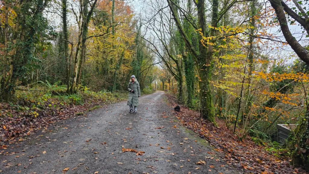 Mrs M and Milo walking down to Tom's Island