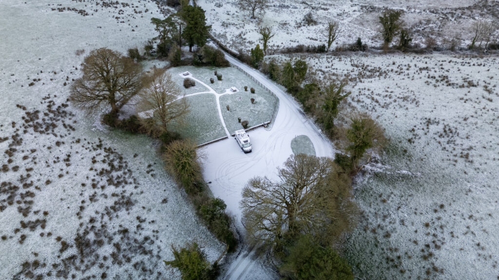 A motorhome parked in a snow covered car park near Trory Jetty, Enniskillen.